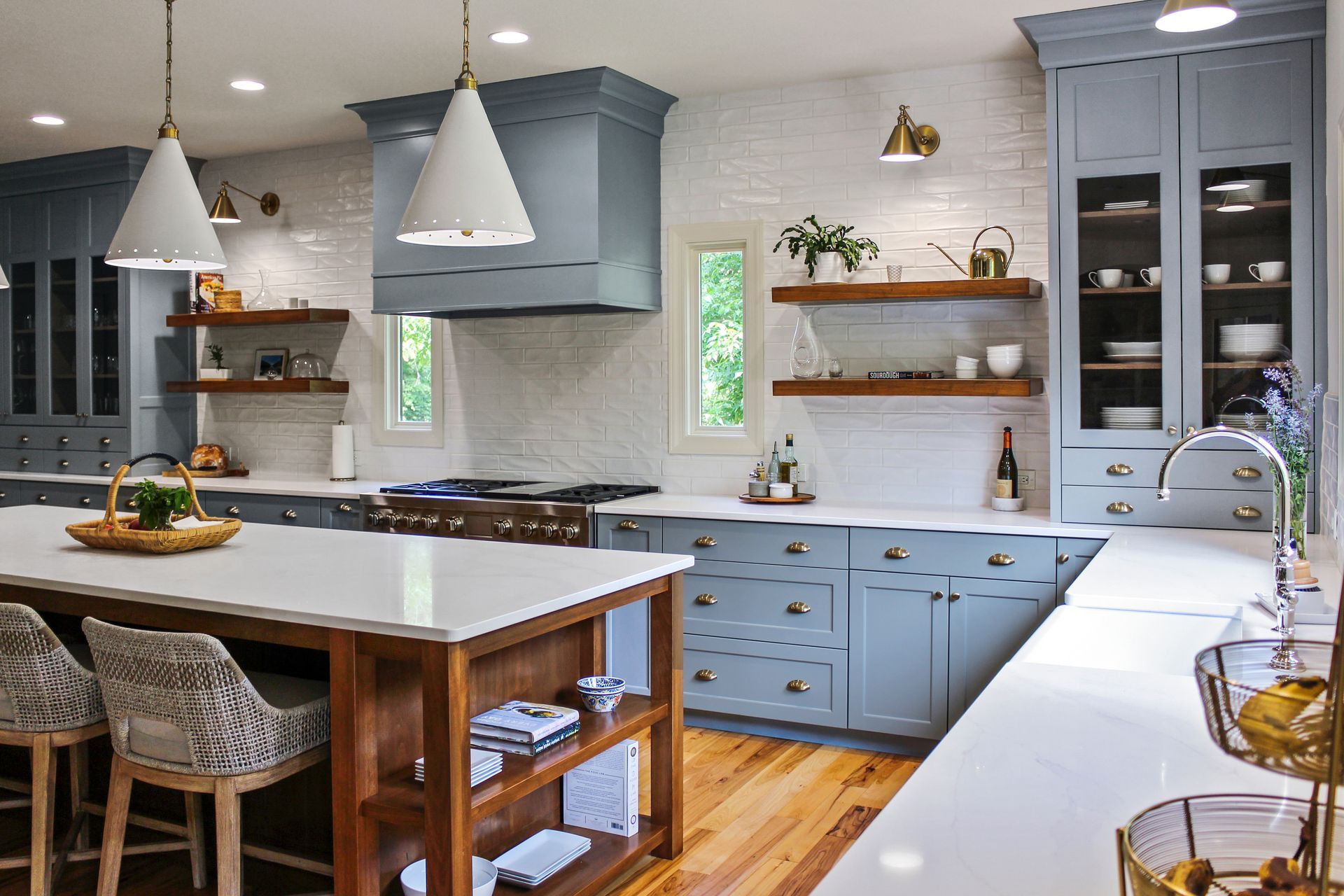 Custom slate blue kitchen with large island in a Columbia MO home. 