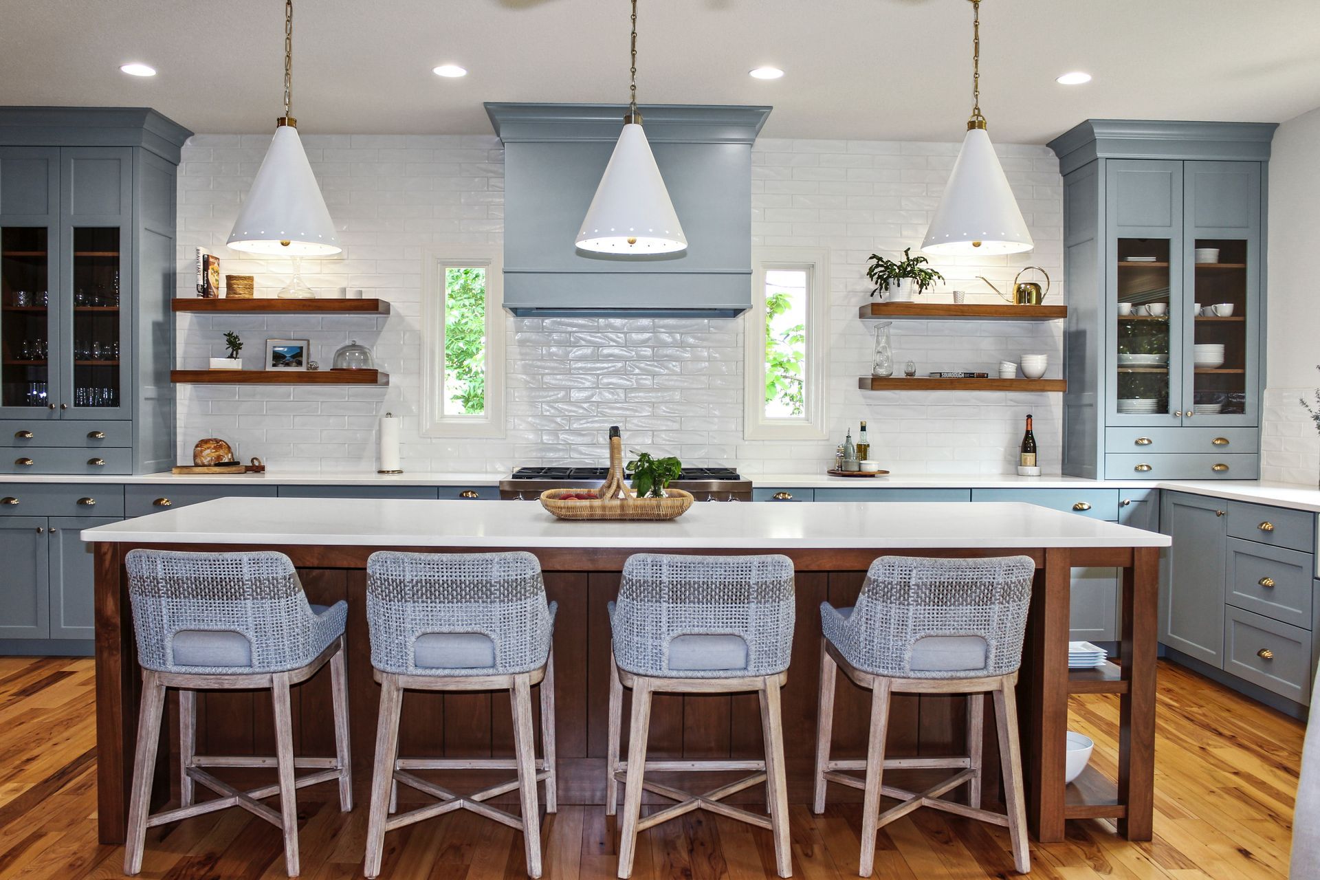Custom slate blue kitchen with large island in a Columbia MO home. 