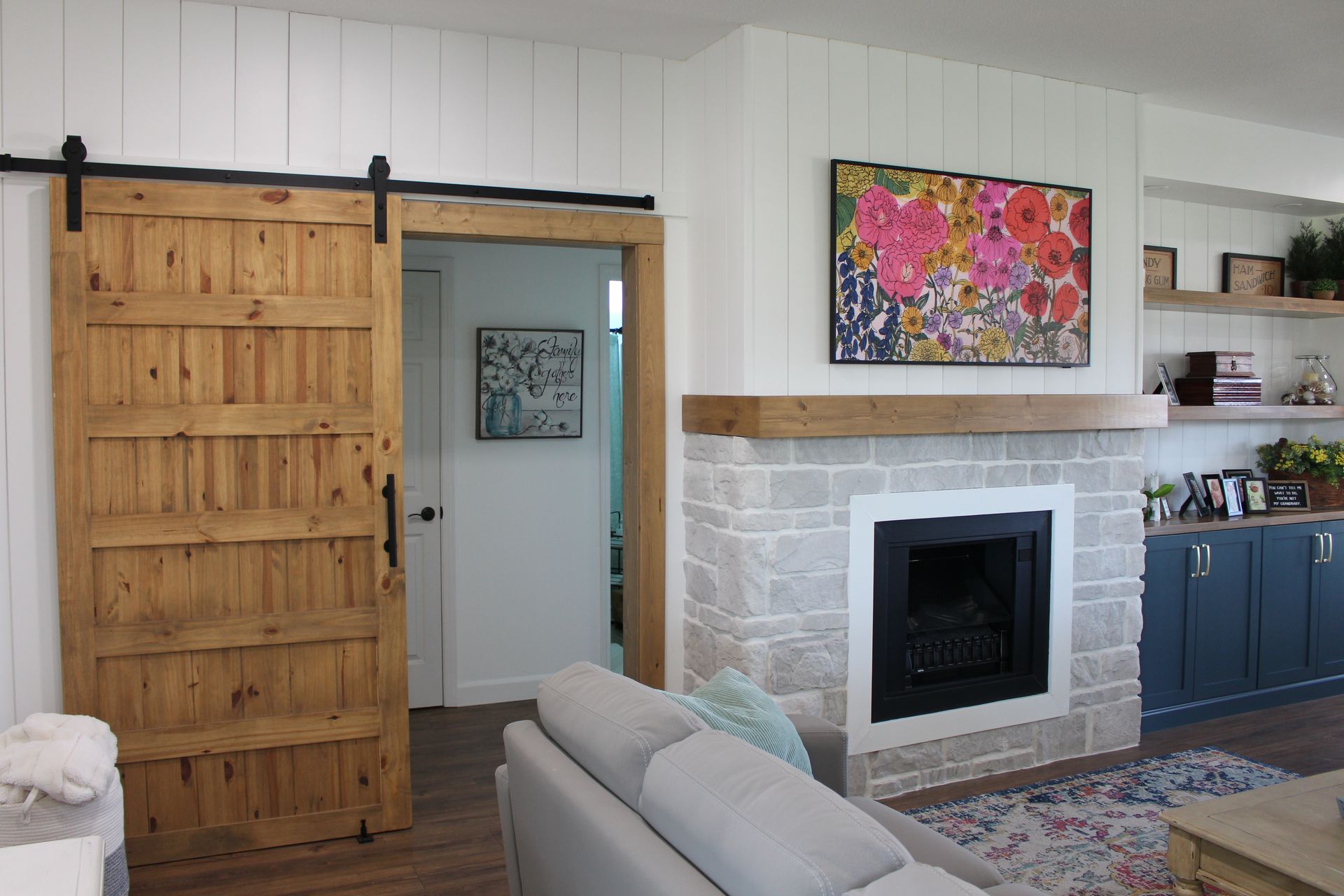 Custom made sliding barn door and a fireplace mantel in Mid-Missouri.