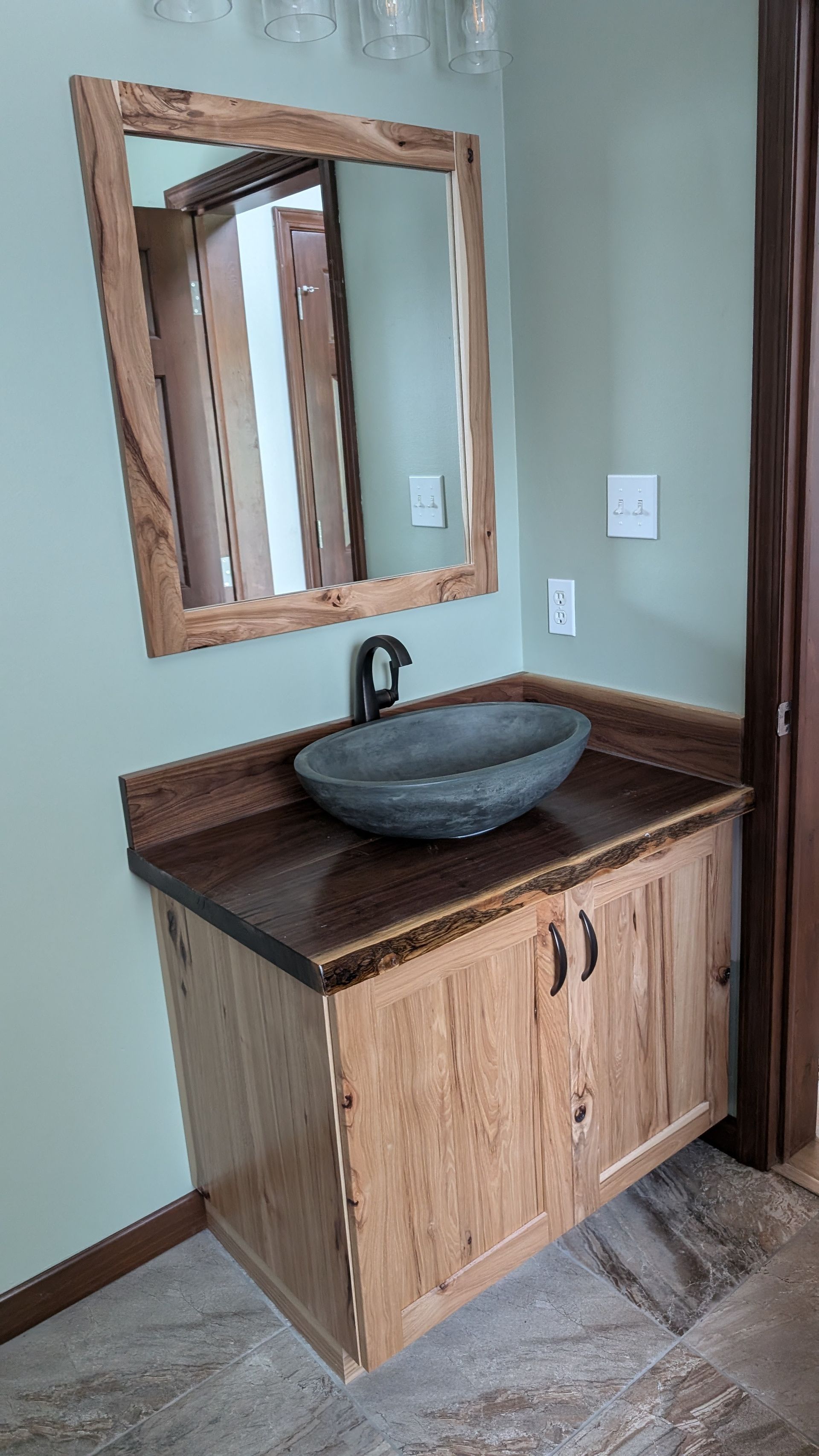 A custom bathroom vanity and shower