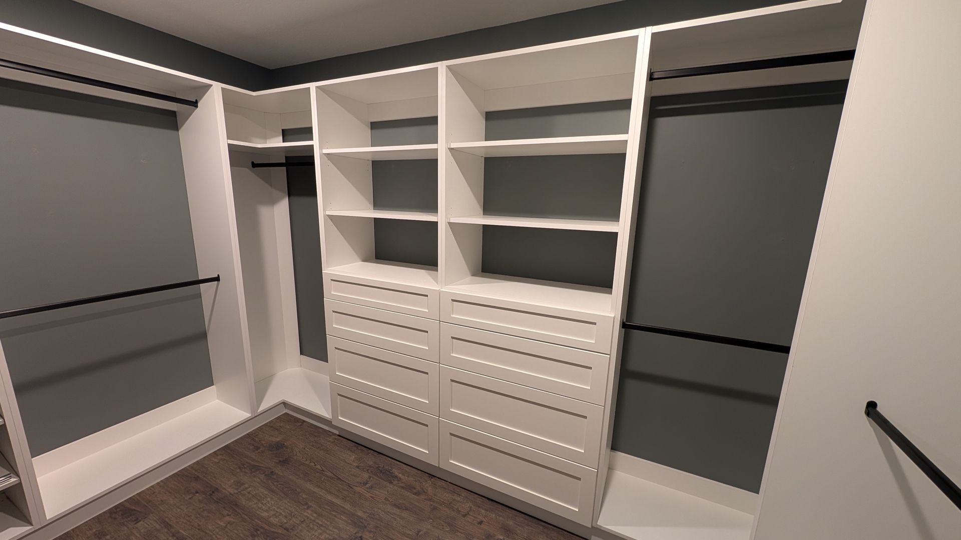 A custom walk in closet with lots of shelves and drawers in Fulton MO