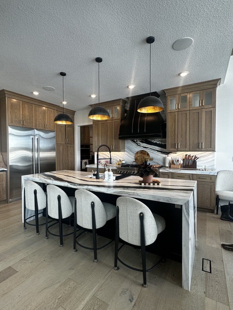 Custom kitchen with large waterfall island in Mid-Missouri