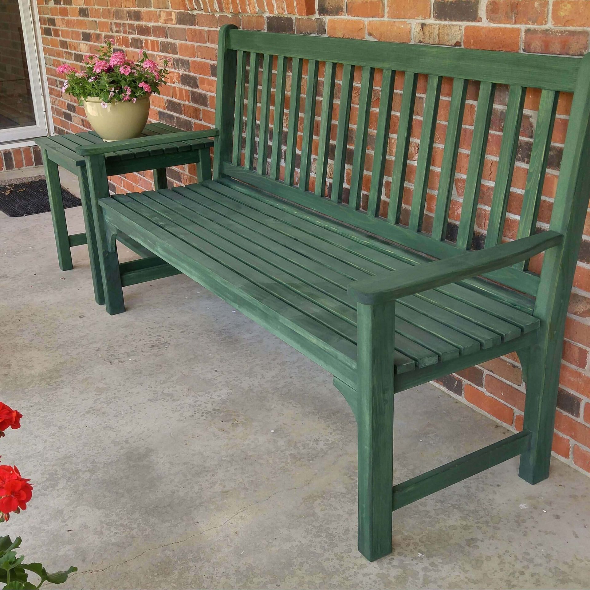 A custom made green bench in Fulton MO. 