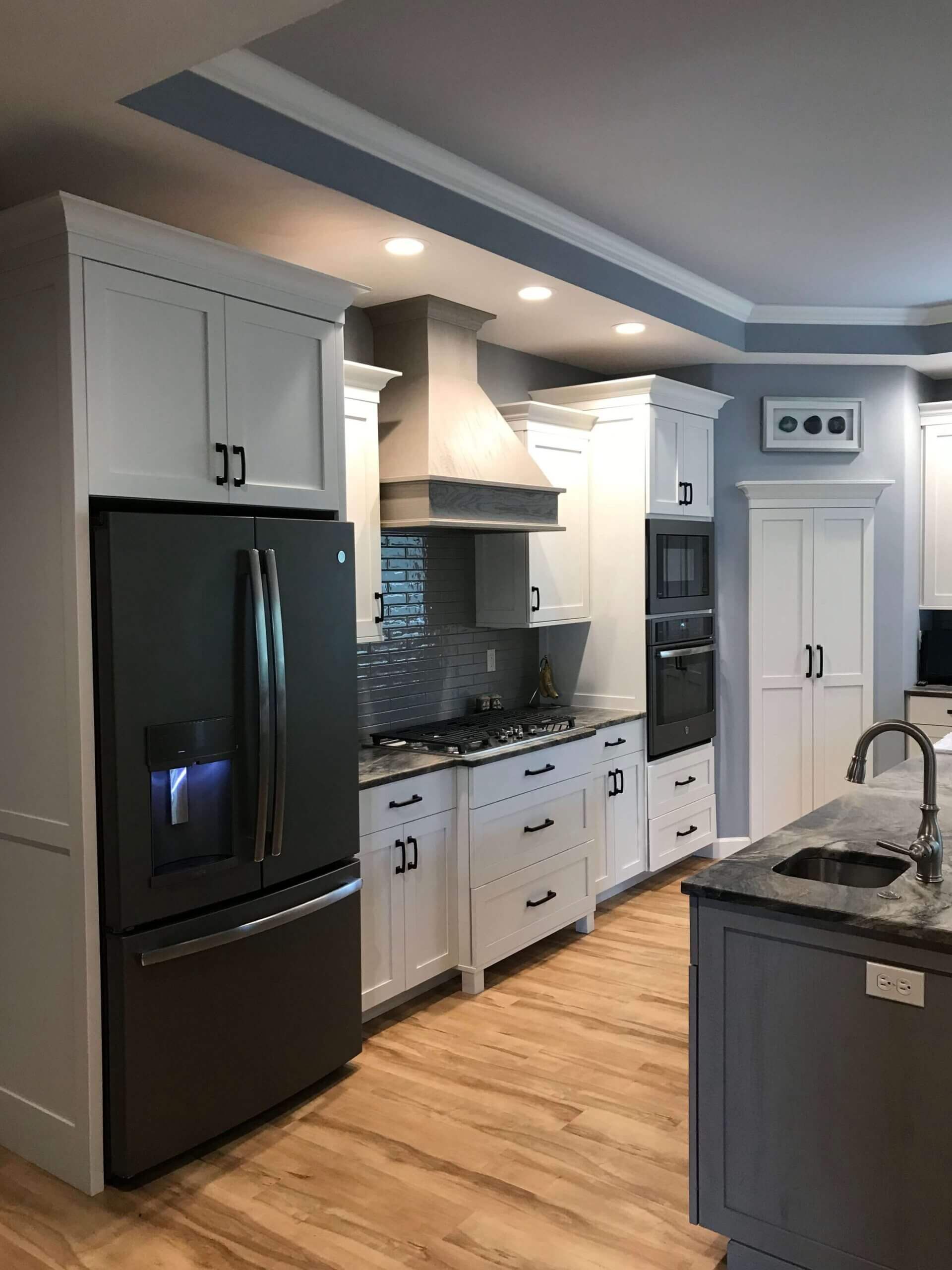 A custom kitchen with white cabinets in Fulton Missouri.