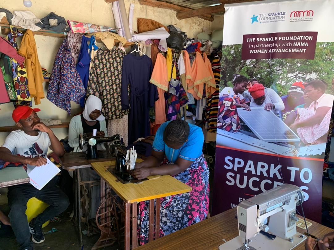 Women participate in a sewing and garment-making training session as part of The Sparkle Foundation’s livelihoods work, developing practical skills that can help them create income opportunities and build greater financial independence for themselves and their families.