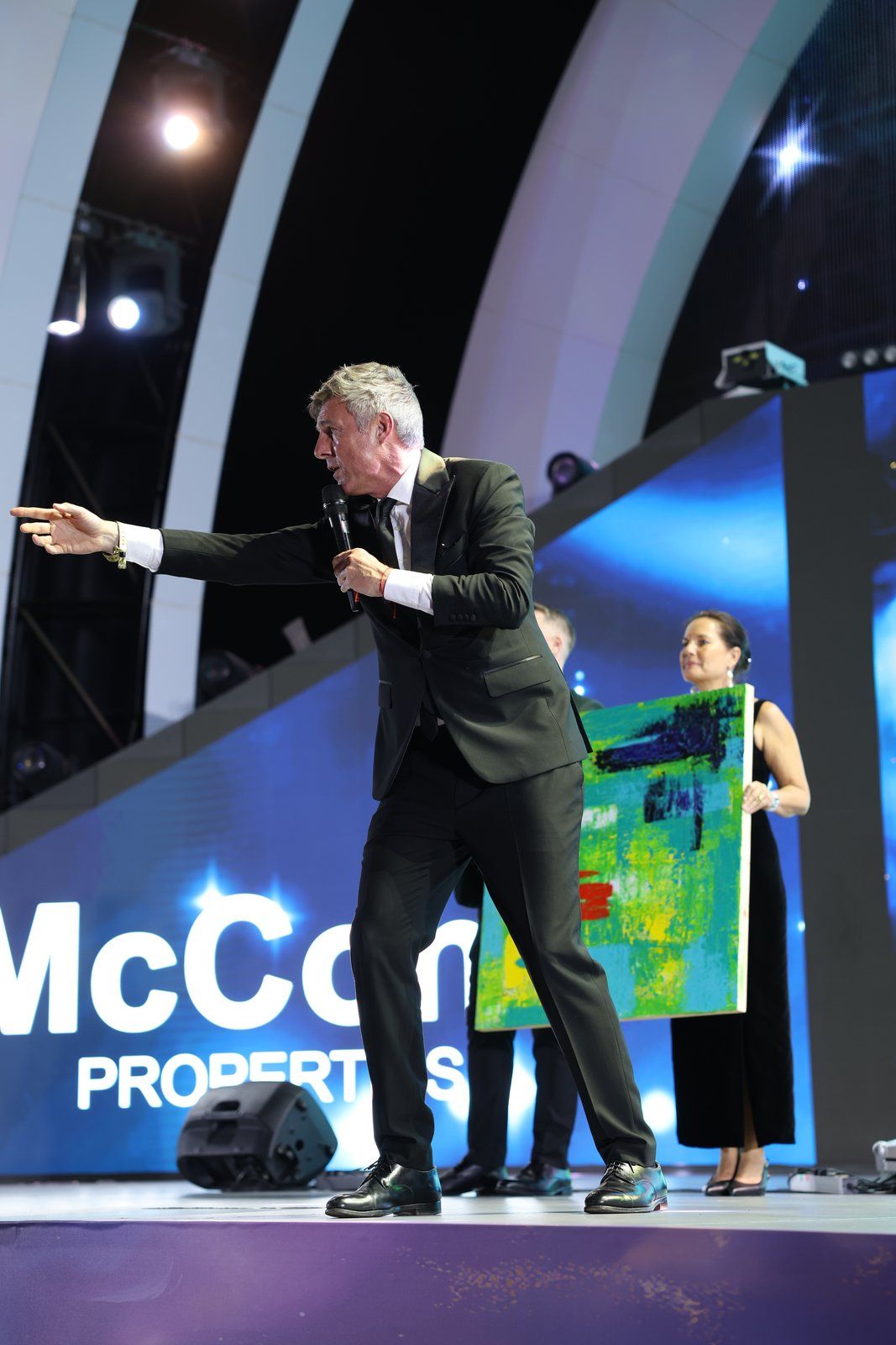 The live auctioneer on stage