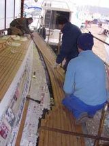 Riparazione coperta in teak