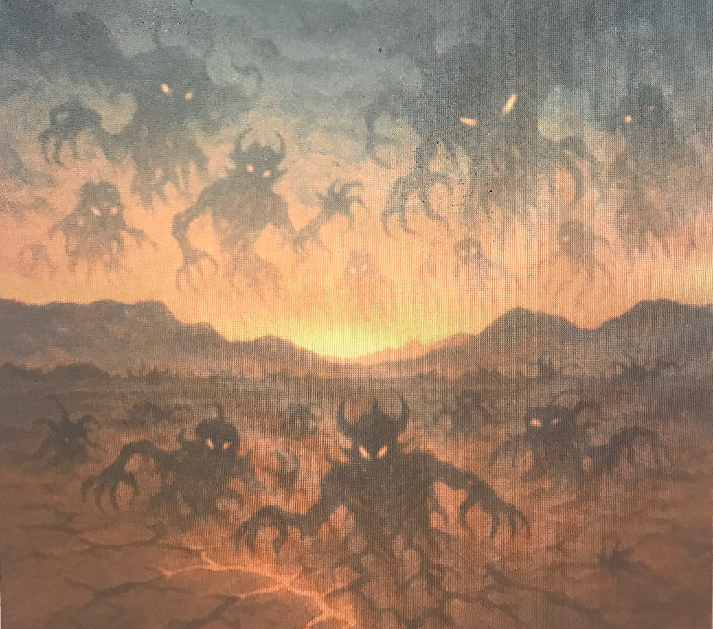 Silhouettes of deer in a misty desert at sunrise with orange sky and distant mountains