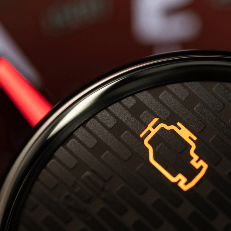 a picture of an engine light on the dashboard of a car