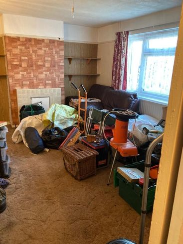 Image showing room with everything bagged up ready to go Room inside property. Terry's house clearance have bagged everything up ready to be removed