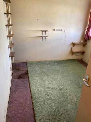 Image of room after it has had everything removed except for the carpets and curtains Room inside property after Terry's house clearance have removed all items