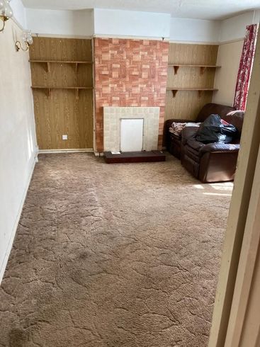 Image of room with all items removed except for the items the client wanted left Room inside property. Terry's house clearance have removed everything except for the carpet and a few items the client waned to be left