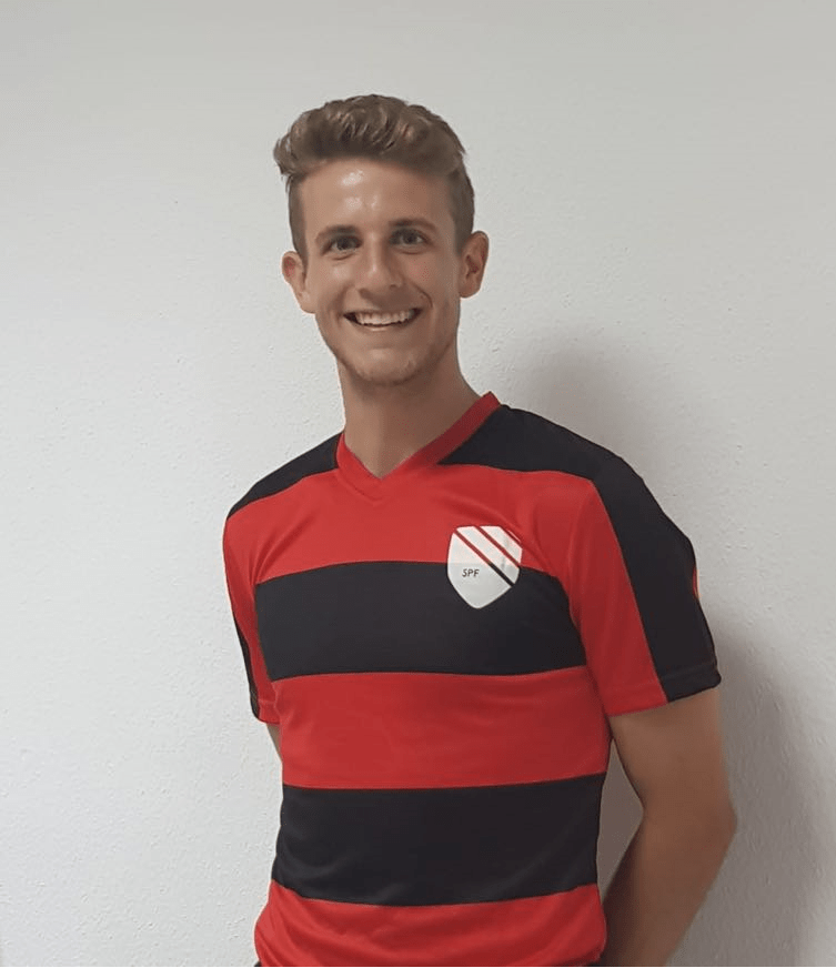 Olimpic Xativa wearing a red and black striped shirt