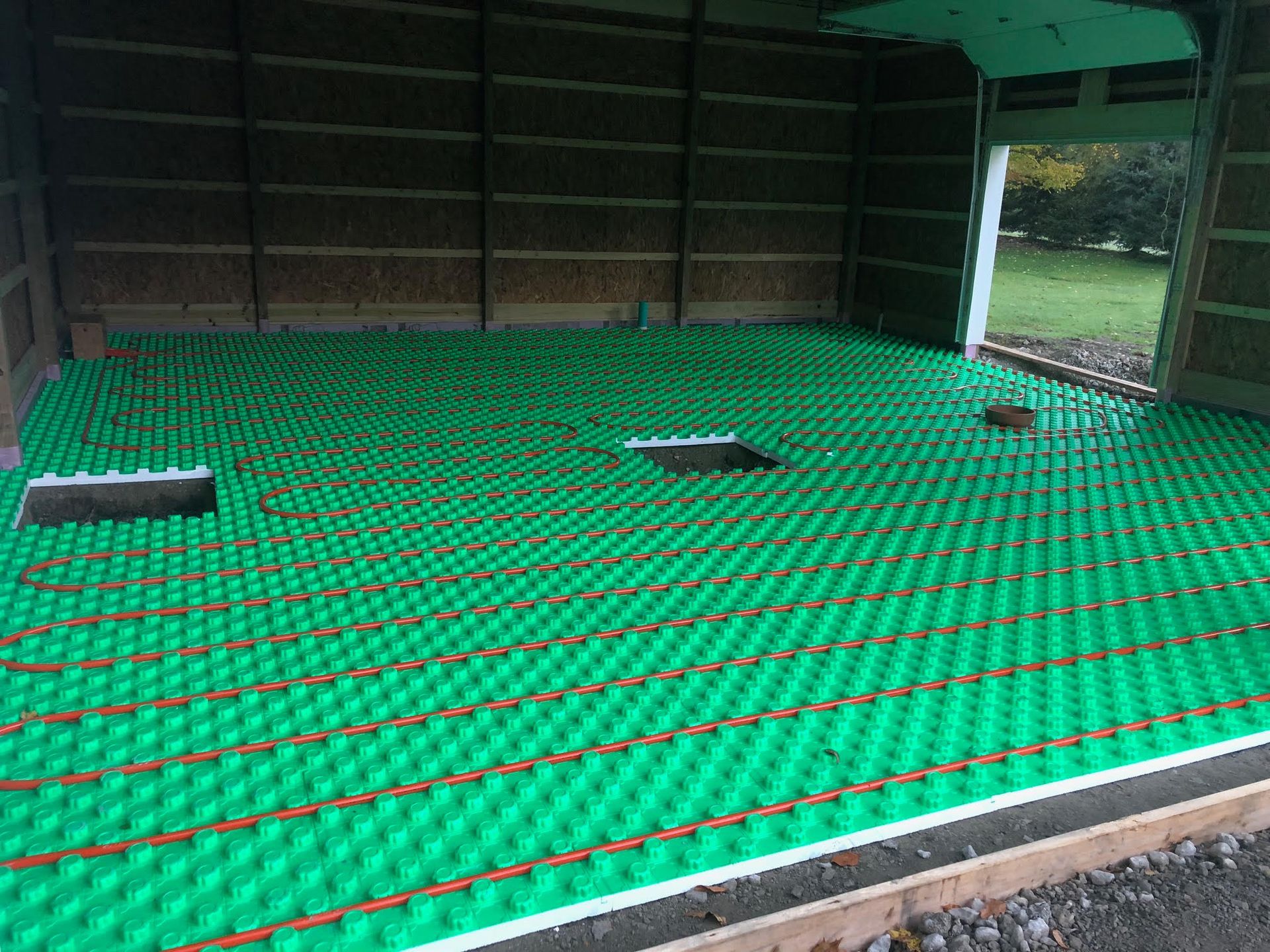 Green radiant floor system installed in a building interior, ready for concrete.