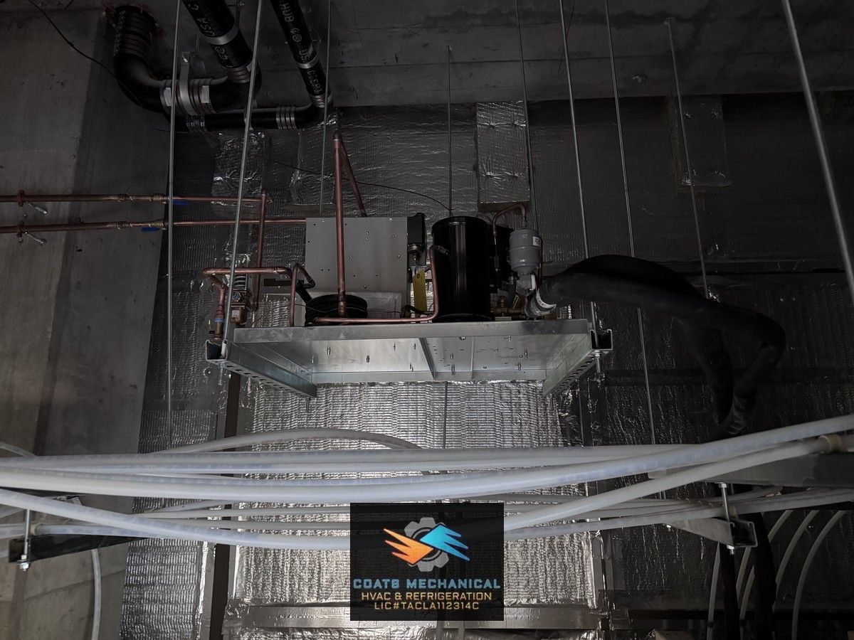 A commercial refrigeration system in progress, lines run clean and organized for reliable performance.