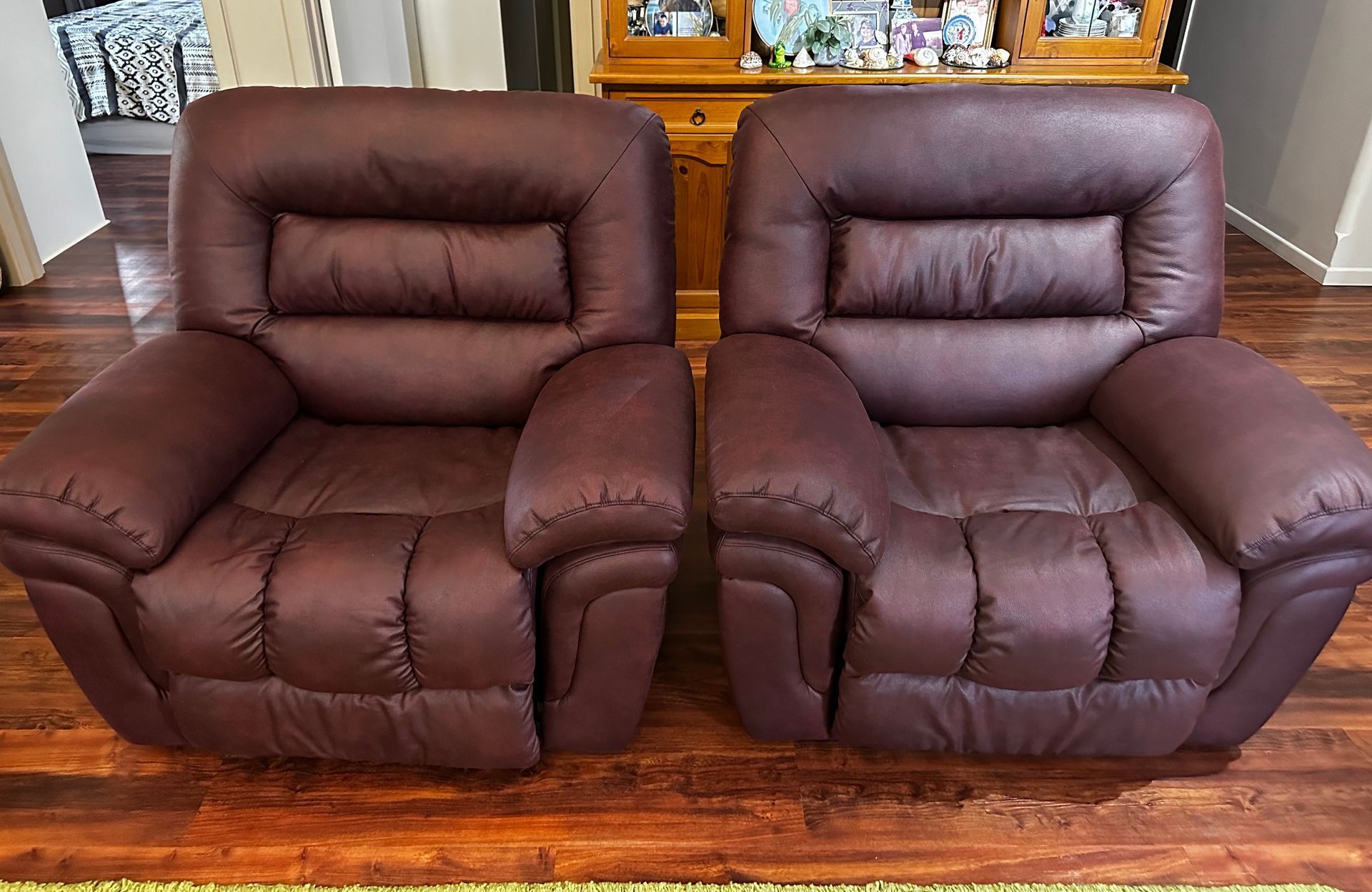 Two Maroon Recliner Chairs Next To Each Other — Paulie's Upholstery in Edmonton, QLD