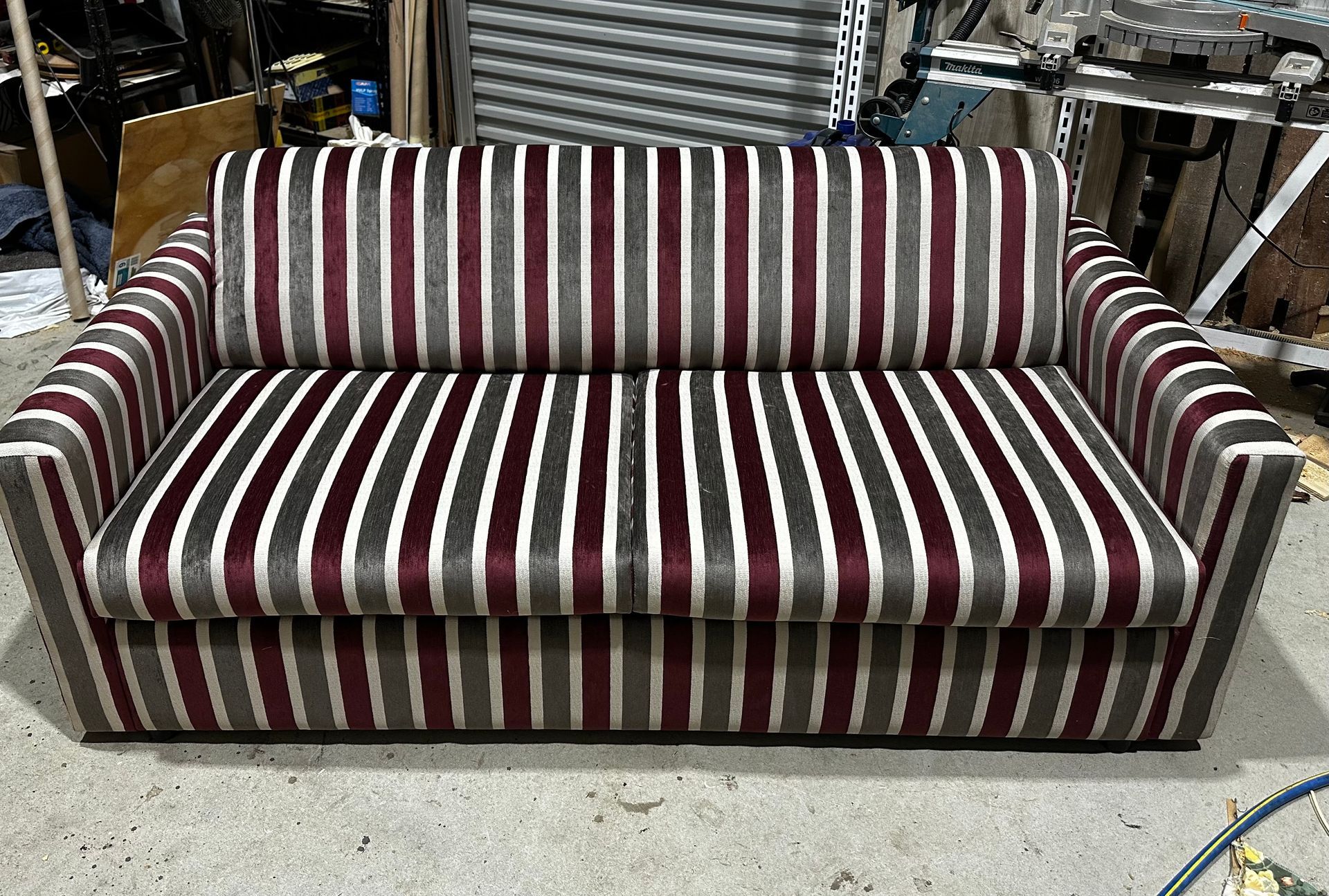 A Striped Couch On The Floor — Paulie's Upholstery in Edmonton, QLD