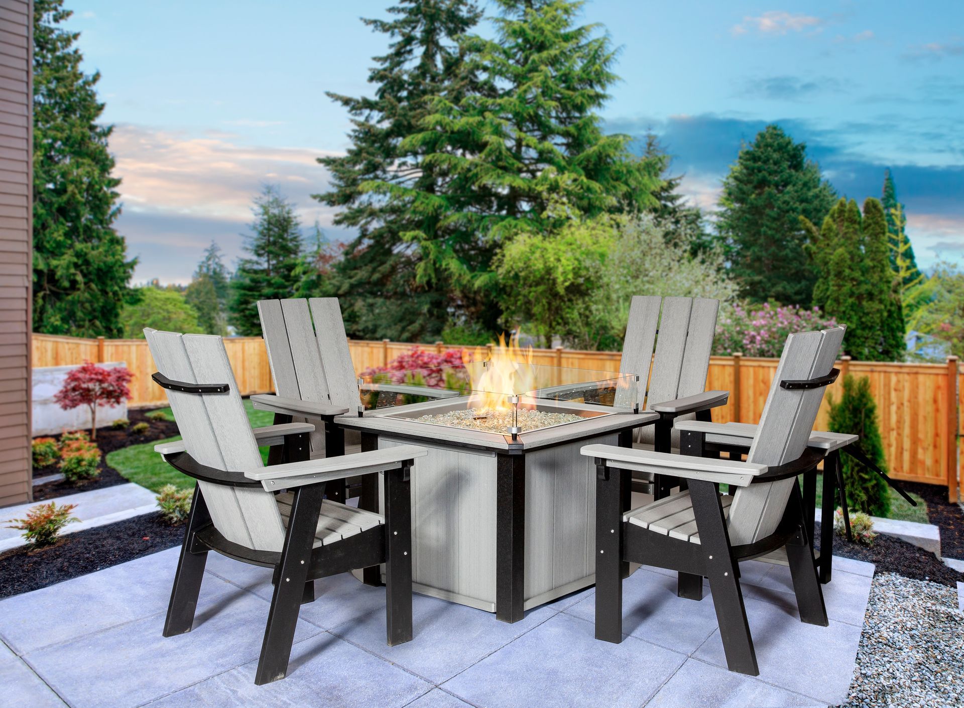 There is a fire pit in the middle of the patio.