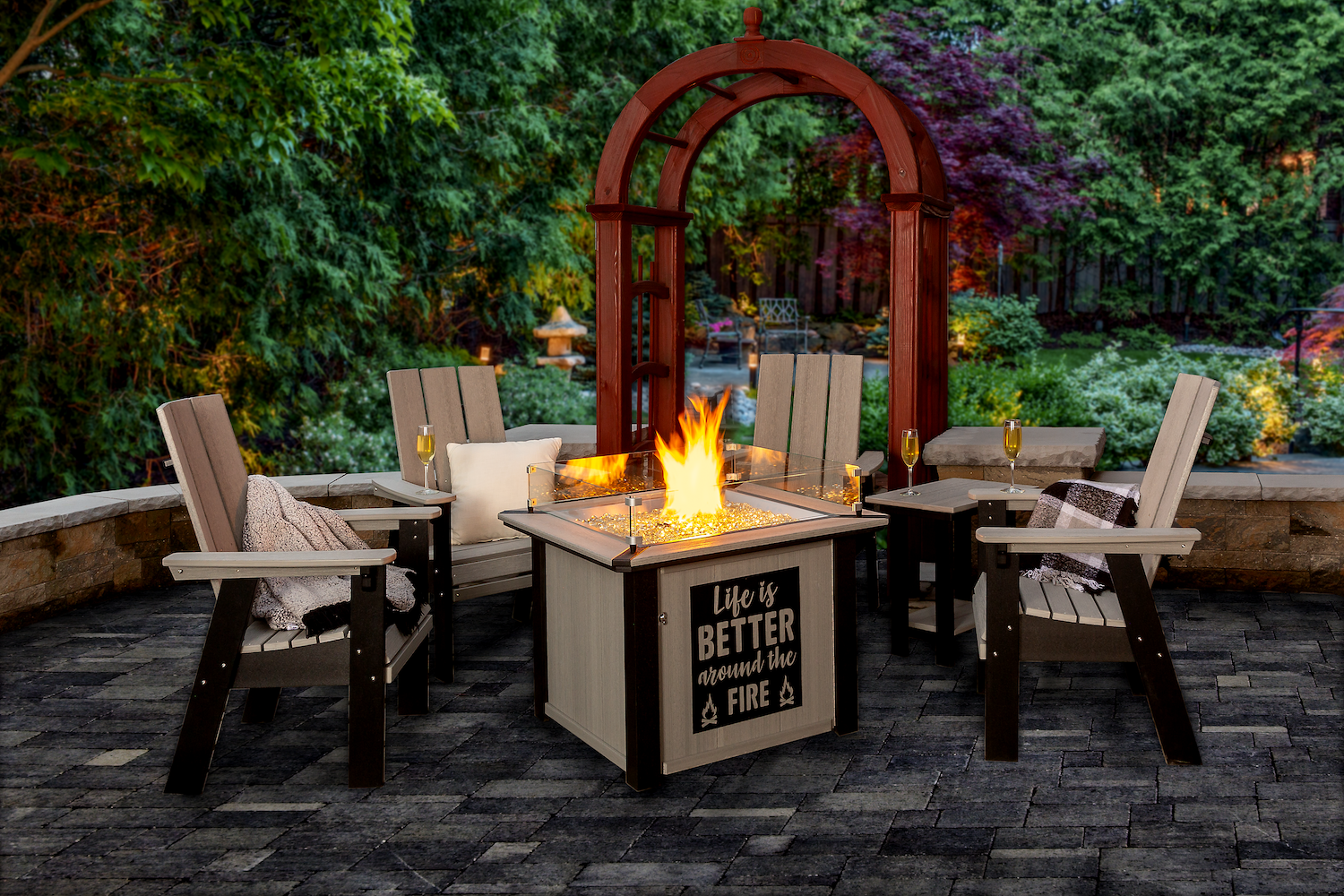 There is a fire pit in the middle of the patio.
