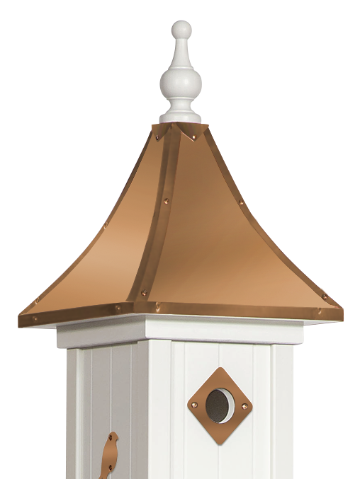 White rooftop structure with copper roof, featuring windows.