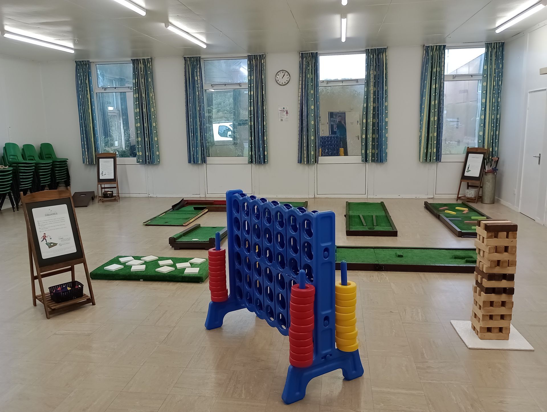 Giant connect four lawn game hire in a room for a wedding party with our crazy golf game hire.