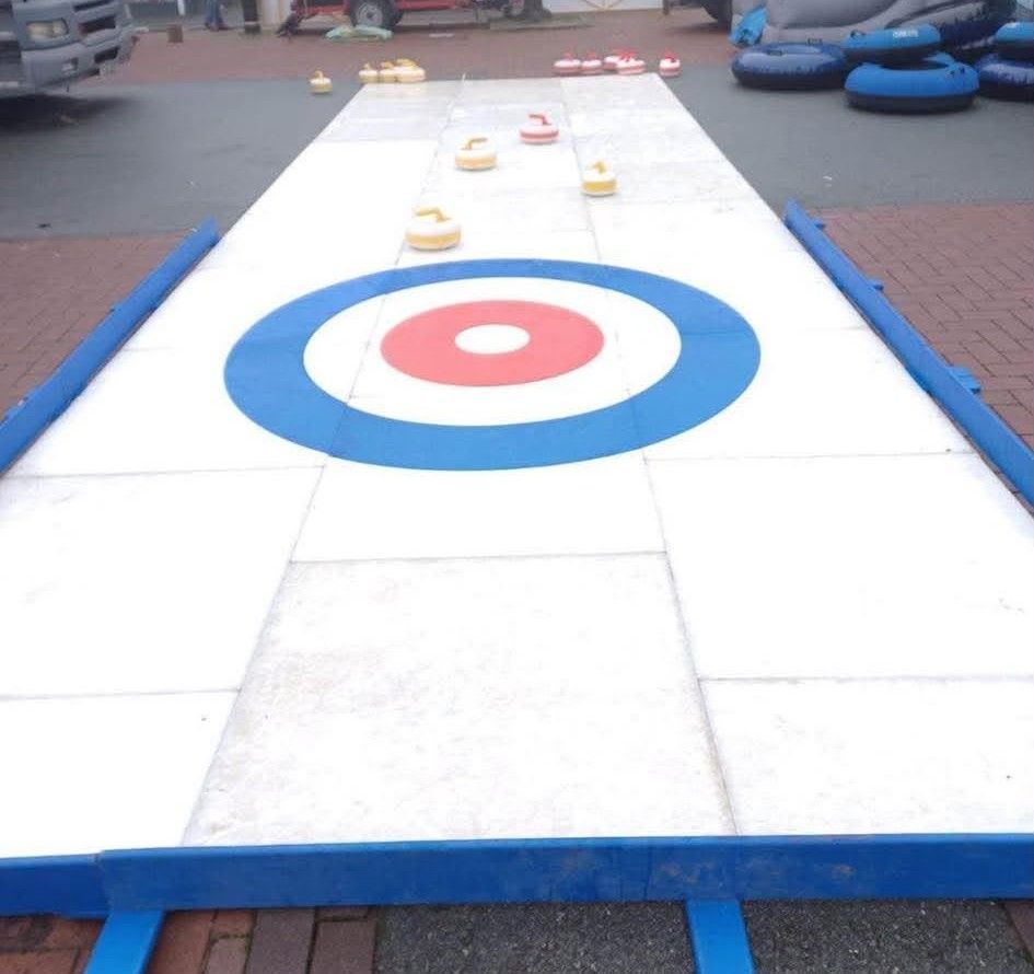 Archery tag set up indoors in a sports hall. Blow up bunkers.
