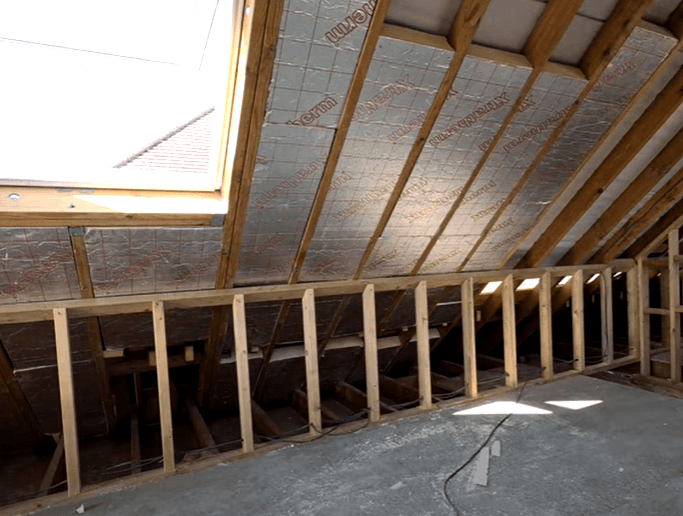 Loft conversion roof insulation showing skylight