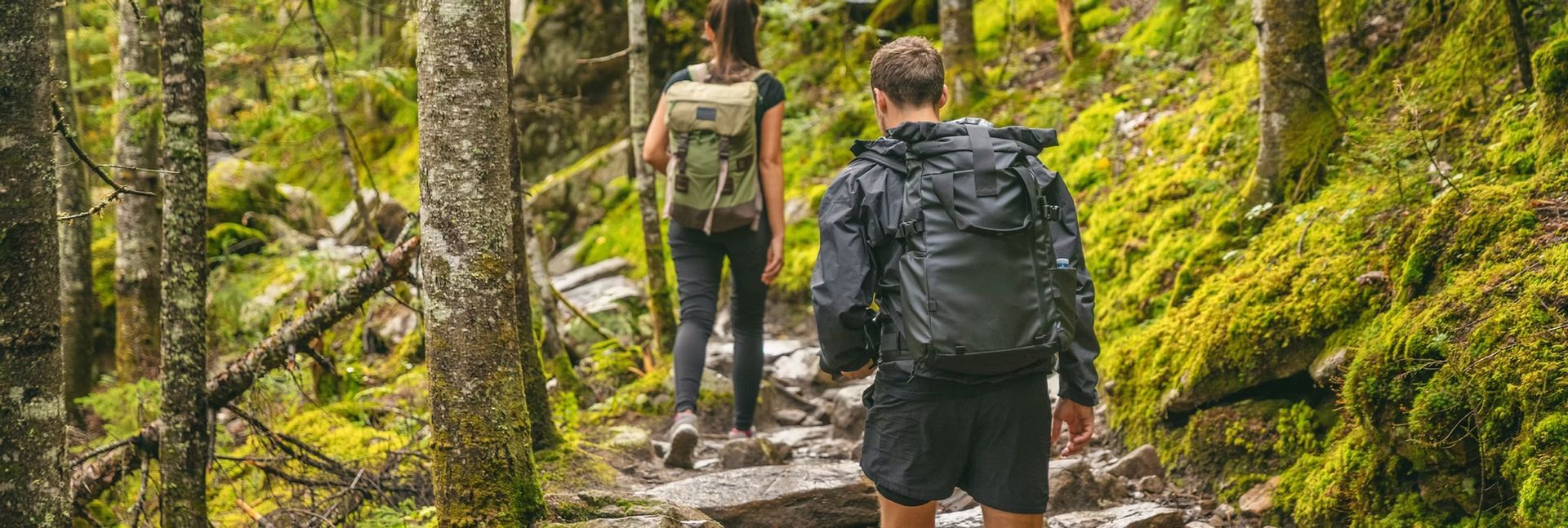 man and woman hiking