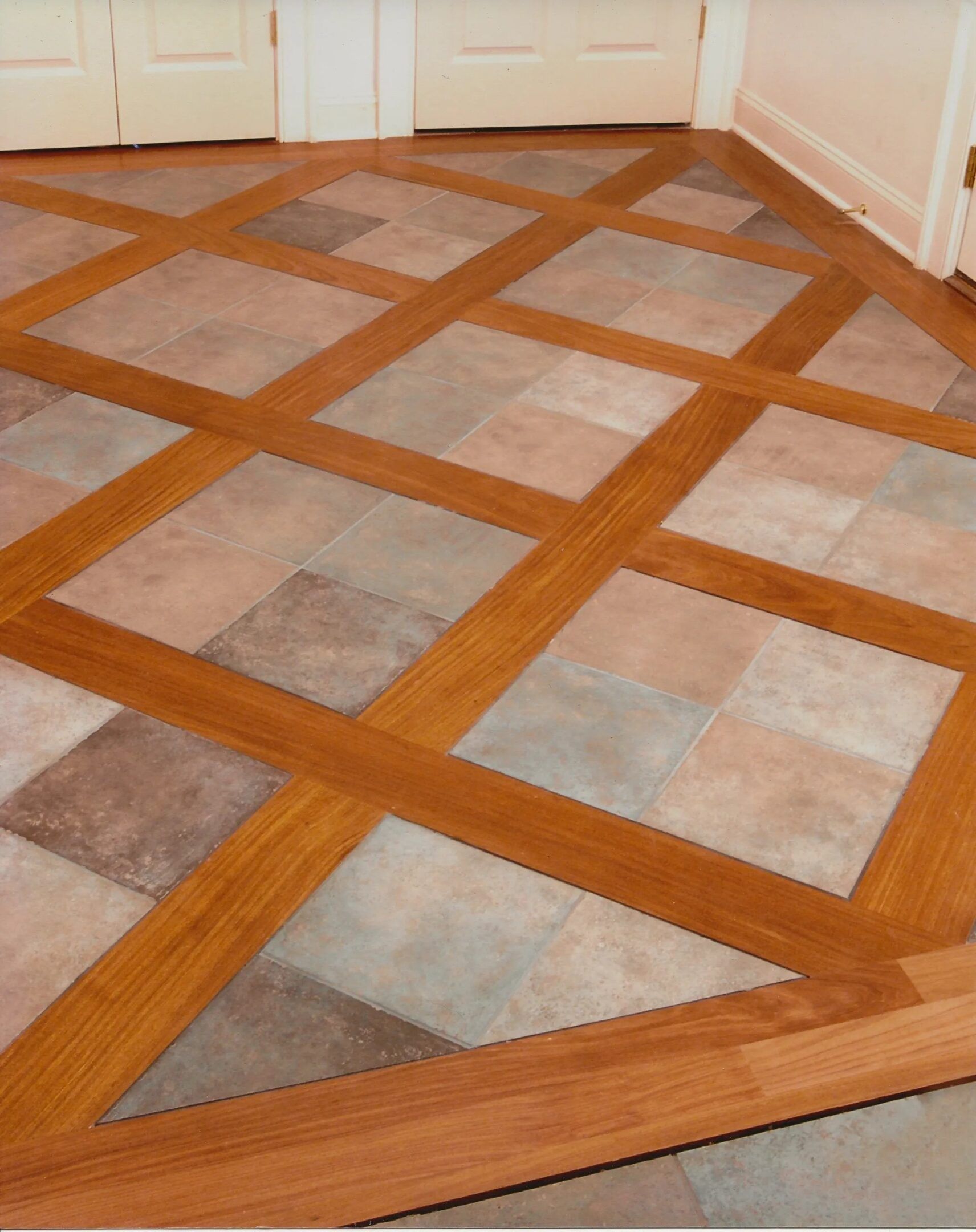 Wooden lattice pattern over light tile floor in a room corner