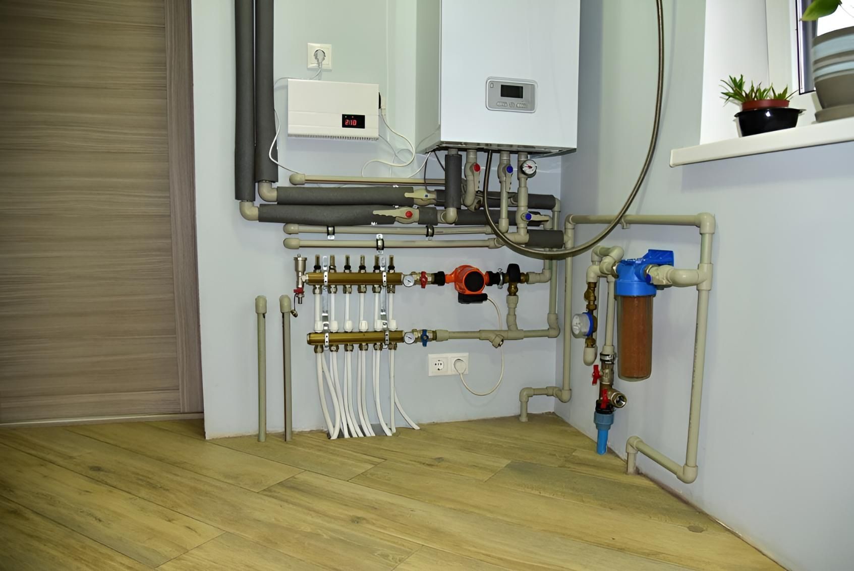Room With a Lot of Pipes and a Boiler on the Wall — Wet & Dry Plumbing & Gas in Gatton, QLD