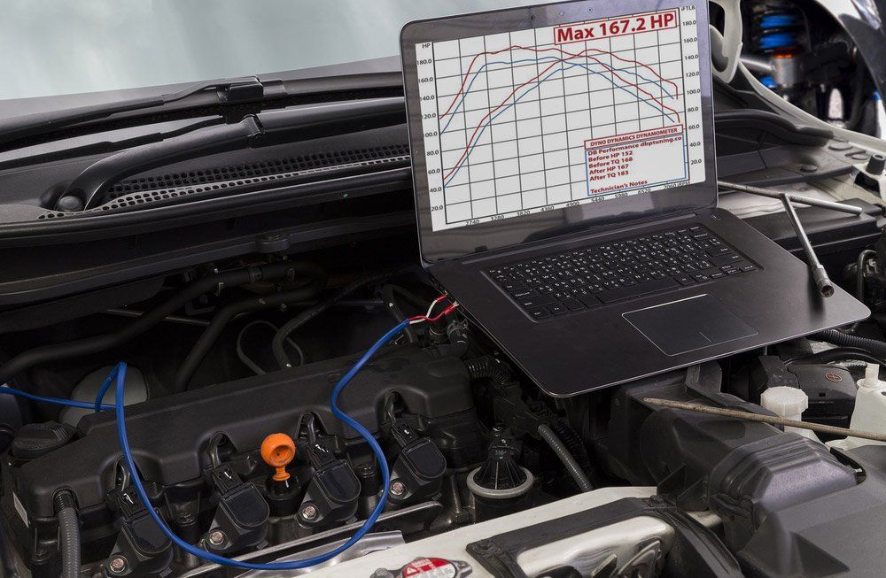 Mechanic Inspecting the Car With Logbook Services — Jon Wilson Mechanical in Eaglehawk, VIC