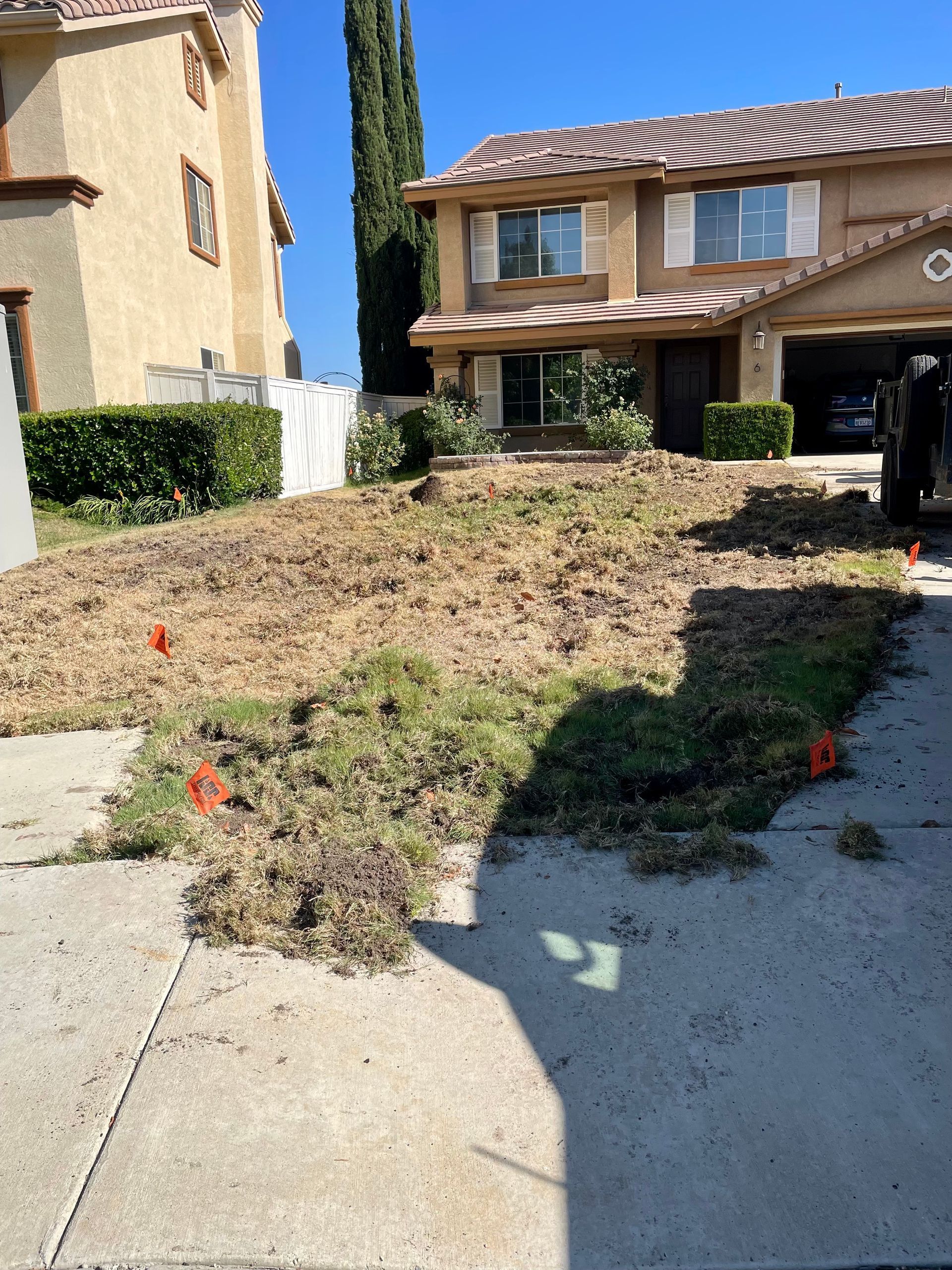a house with a lot of dirt in front of it