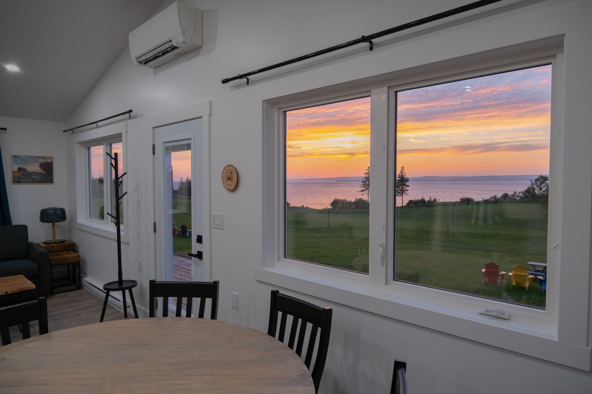 living area with windows over looking the bay of fundy