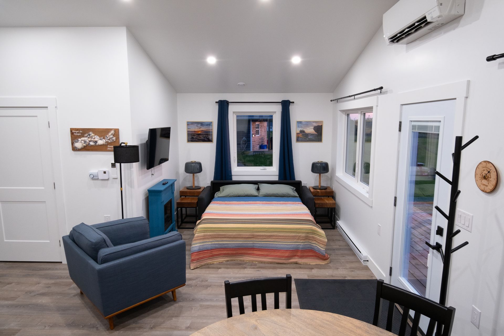 living area with windows over looking the bay of fundy