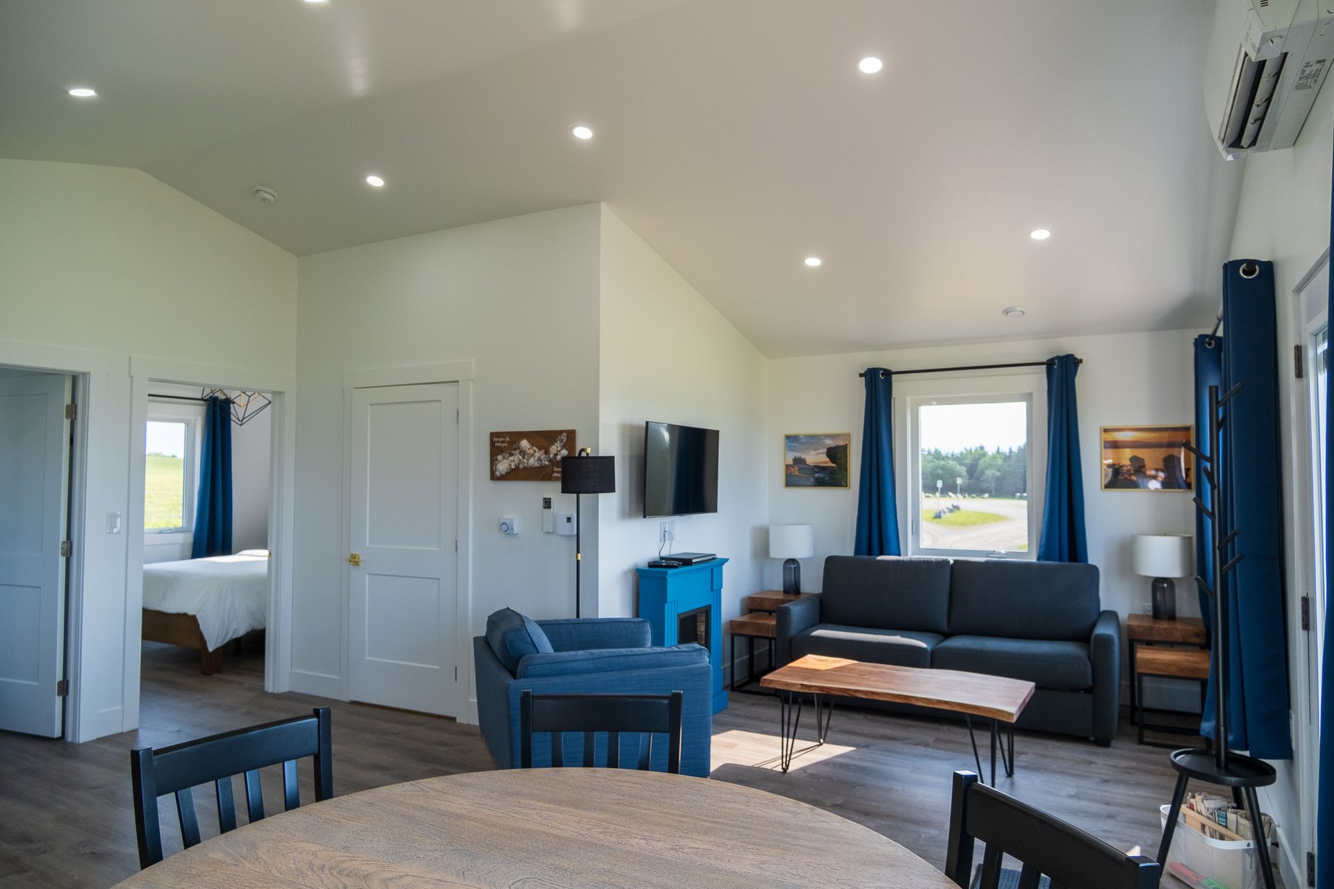 living area with windows over looking the bay of fundy