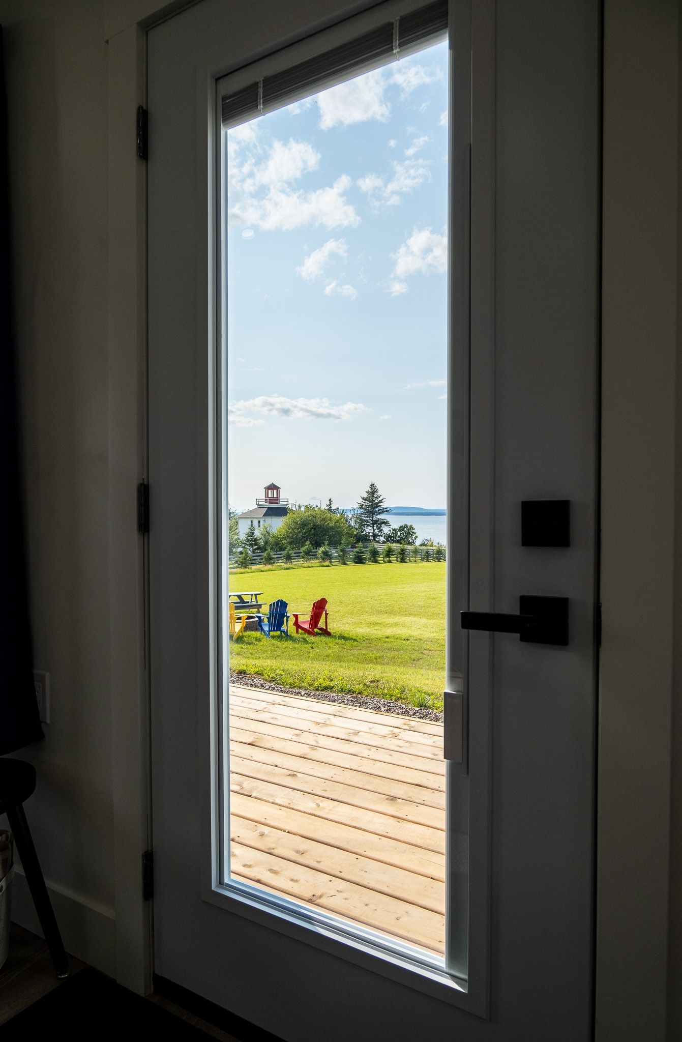 living area with windows over looking the bay of fundy