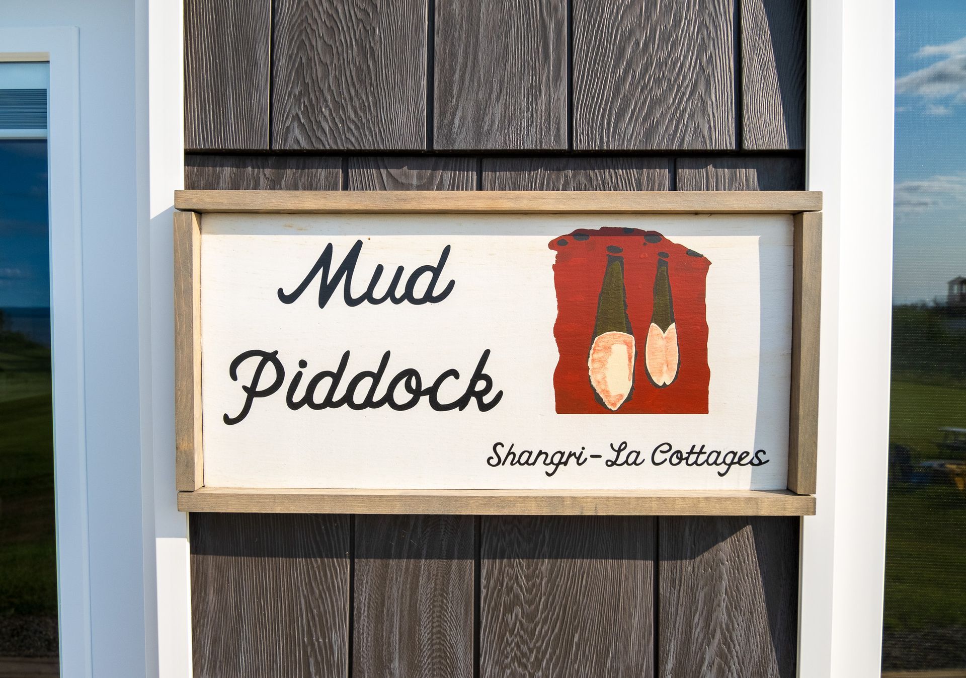 mud piddock cottage sign