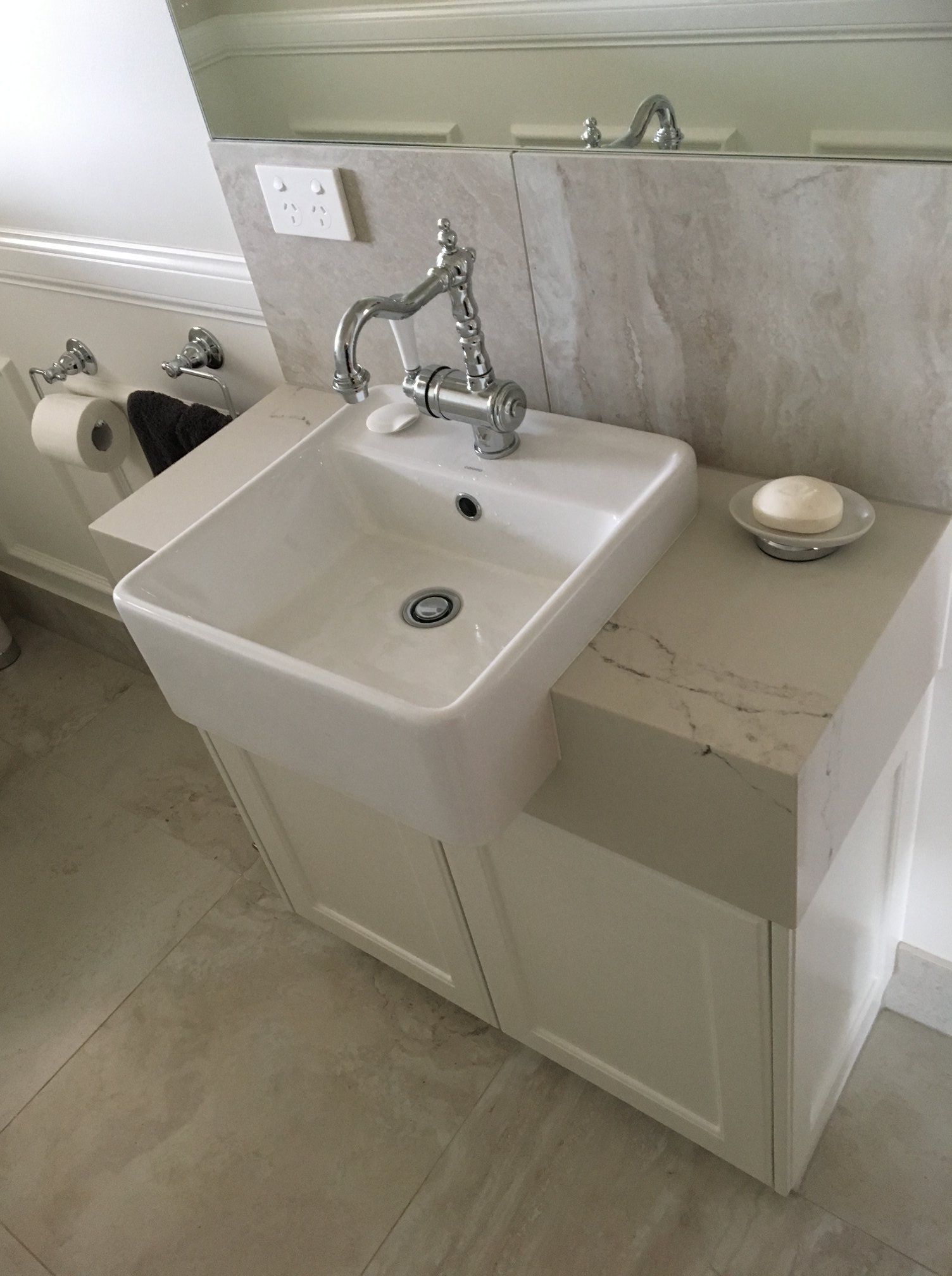 A White Farmhouse-style Sink With a Polished Silver Faucet — Craftsmen Kitchens in Monkland, Qld