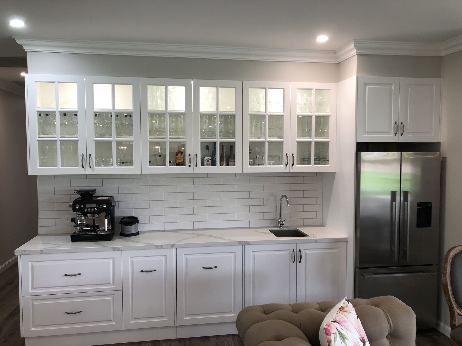 A White Kitchen Wet Bar With Glass-front Cabinets — Craftsmen Kitchens In Monkland, QLD