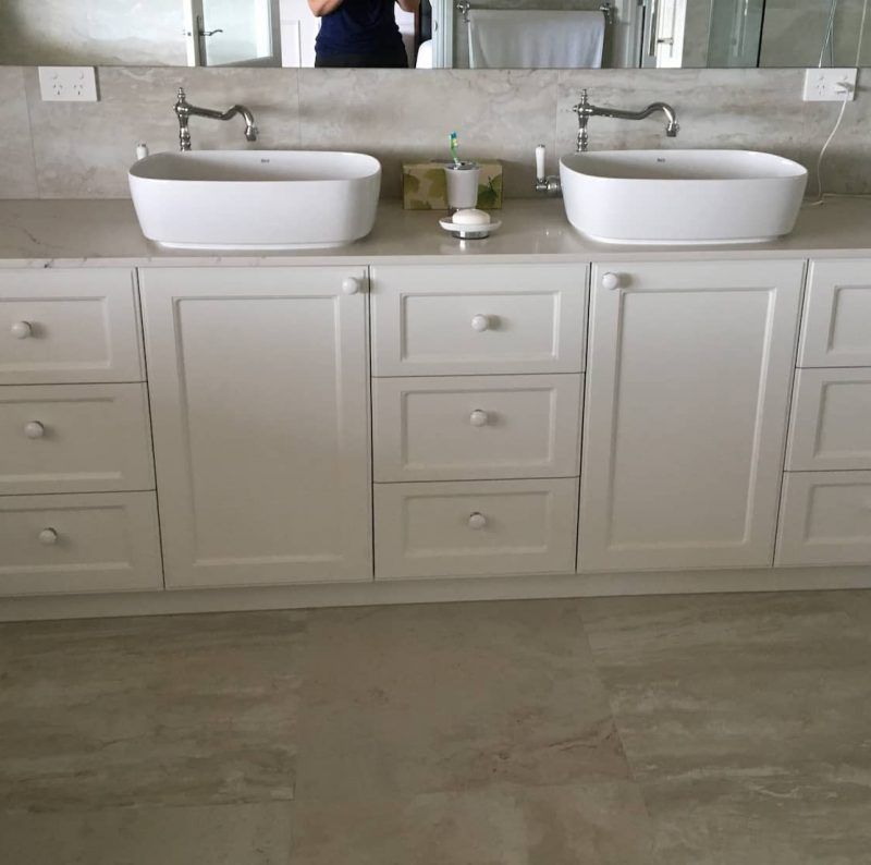 A White Double-sink Bathroom Vanity With Beige Stone Countertops — Craftsmen Kitchens In Monkland, QLD