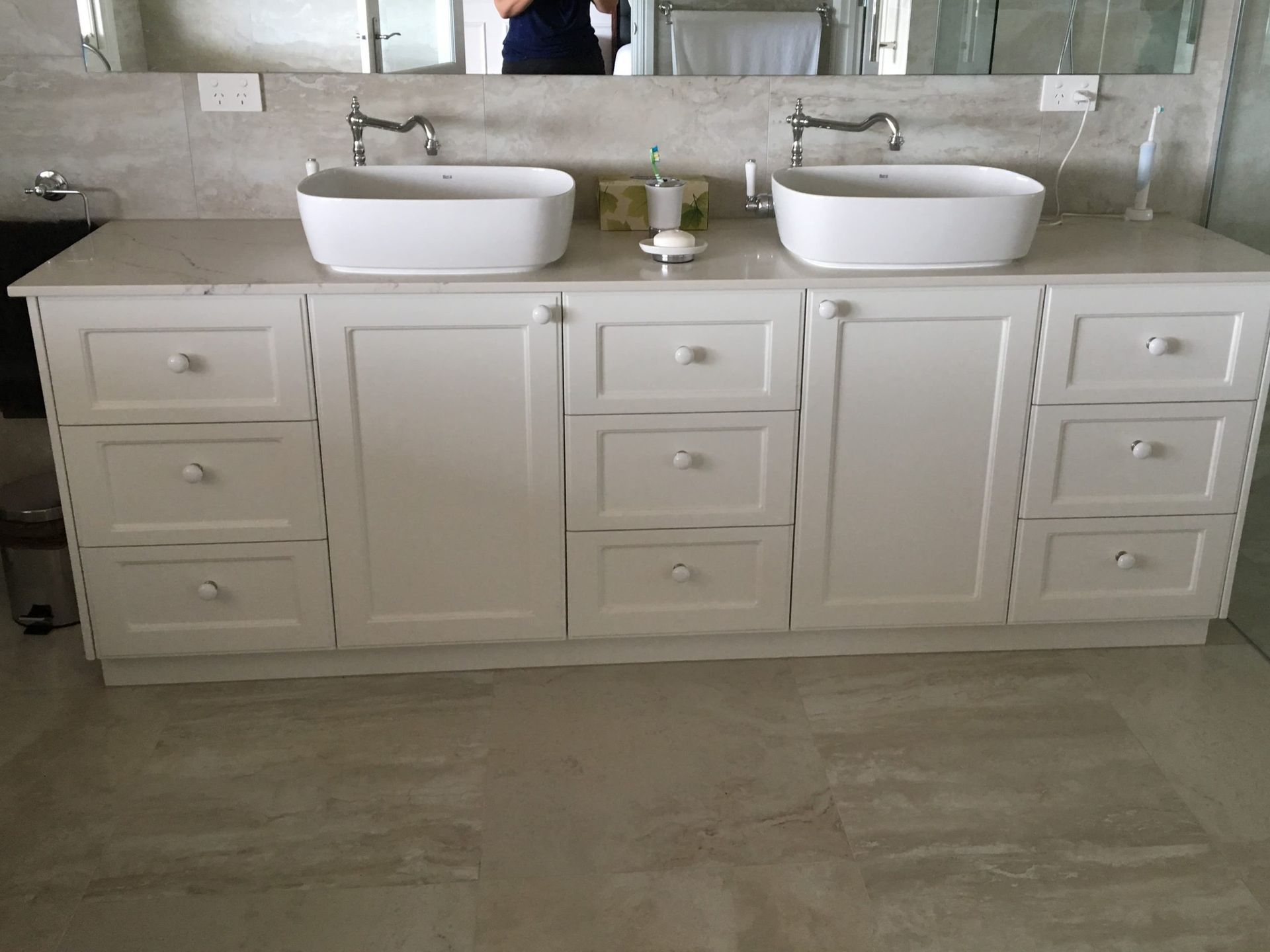 A White Double-sink Bathroom Vanity With Beige Stone Countertops — Craftsmen Kitchens In Monkland, QLD