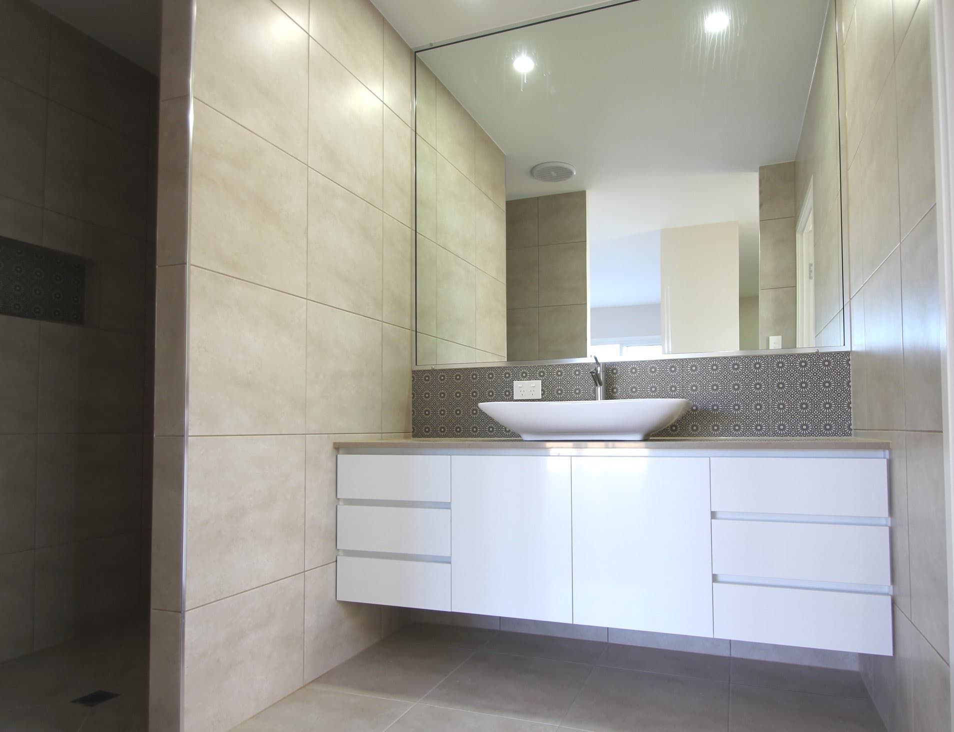 A Modern Floating White Vanity With a Vessel Sink — Craftsmen Kitchens In Monkland, QLD