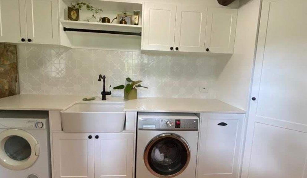 Laundry Room With White Cabinets, a Farmhouse Sink, White Countertops — Craftsmen Kitchens In Monkland, QLD