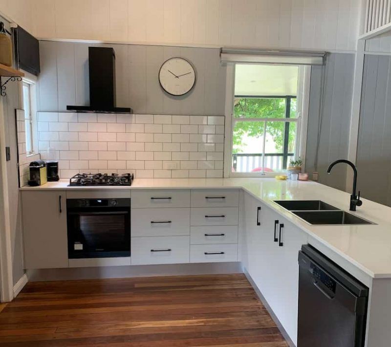 Modern Kitchen With White Cabinets, Light Grey Walls — Craftsmen Kitchens In Monkland, QLD