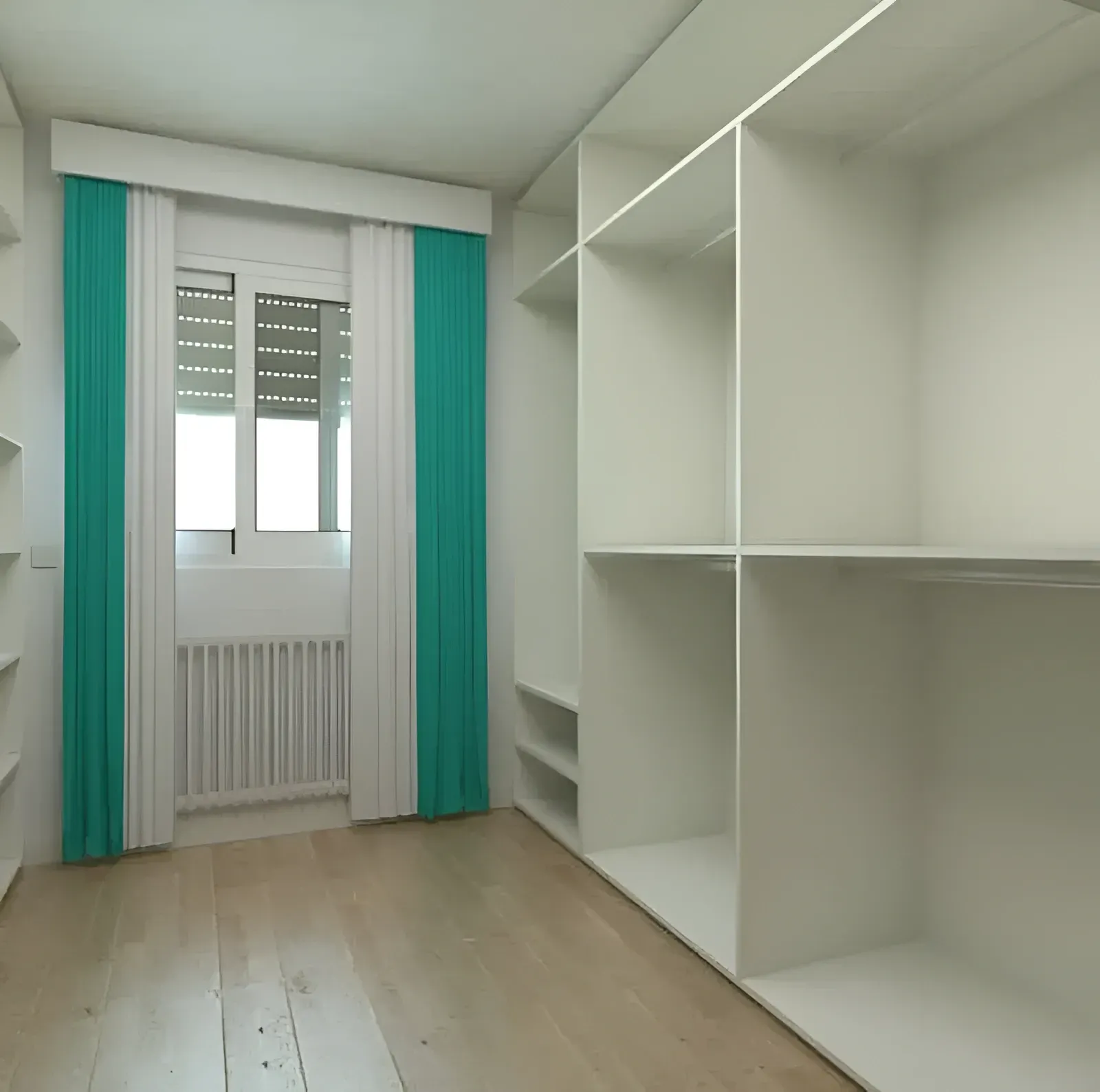 A Modern Walk-in Closet With White Shelving — Craftsmen Kitchens In Monkland, QLD