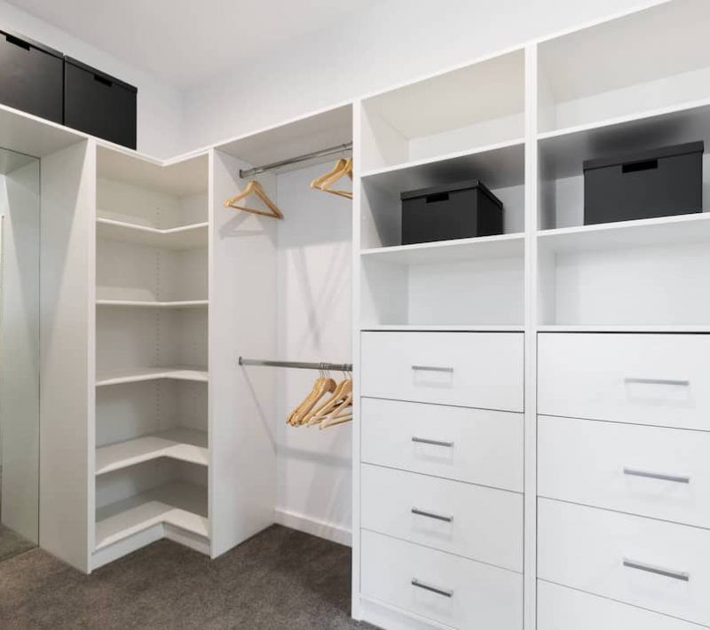 White Closet System With Hanging Rods, Shelving, and Drawers — Craftsmen Kitchens In Monkland, QLD