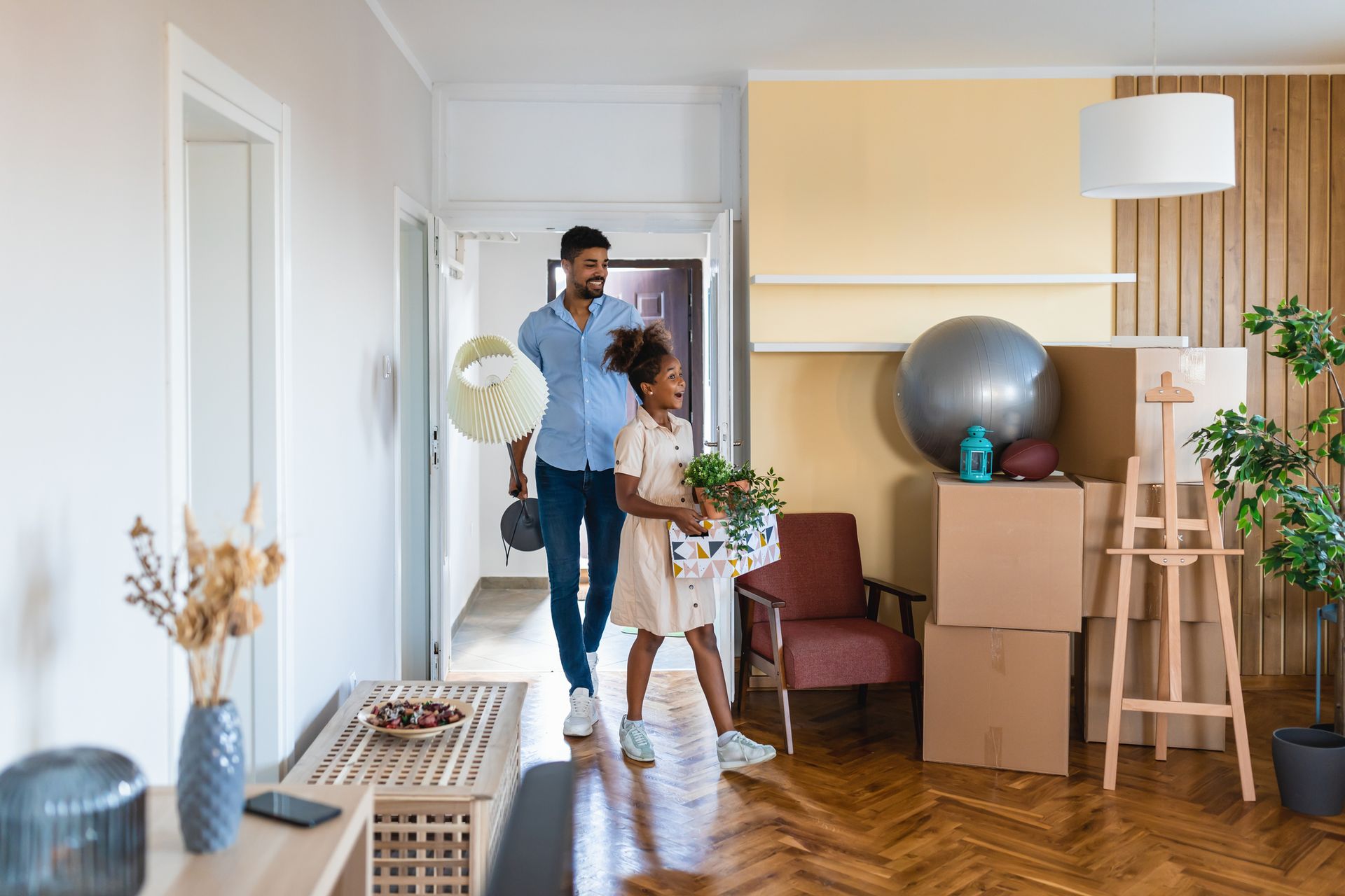 Father And Daughter Enter A New House — Lafayette, LA — Alex Louis Movers