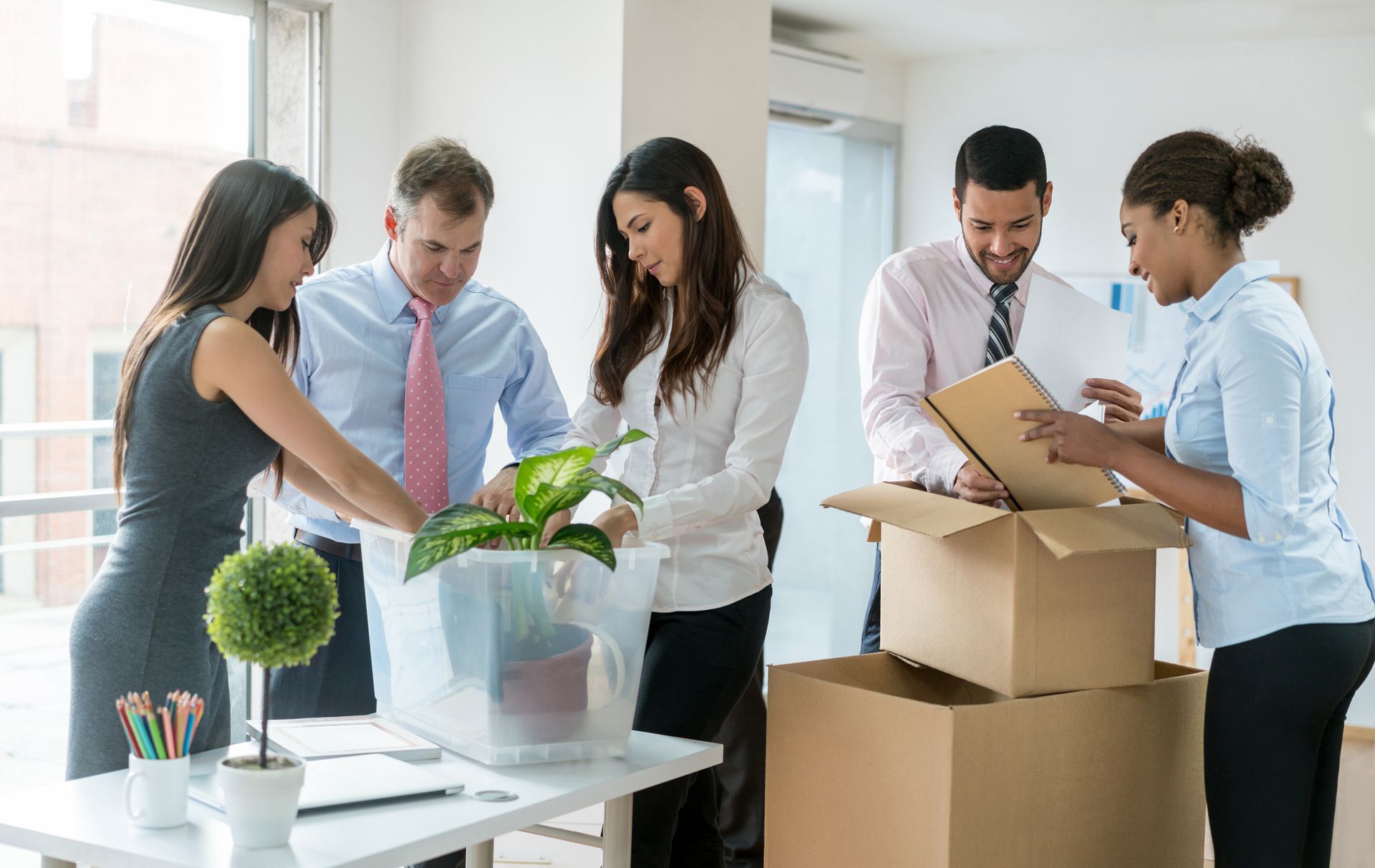 Moving To A New Office And Packing In Boxes — Lafayette, LA — Alex Louis Movers