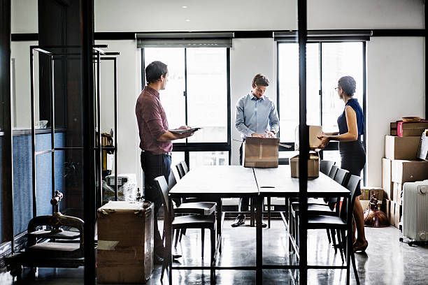 Business People With Packing Boxes — Lafayette, LA — Alex Louis Movers