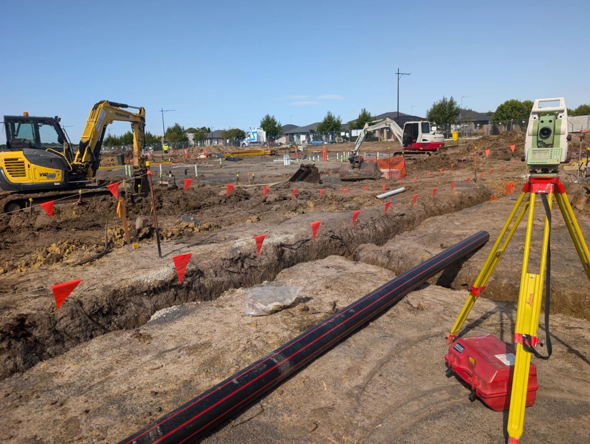 A Concrete Pump Is Pouring Concrete Into A Concrete Floor — Point to Point Surveying In Tatura, VIC